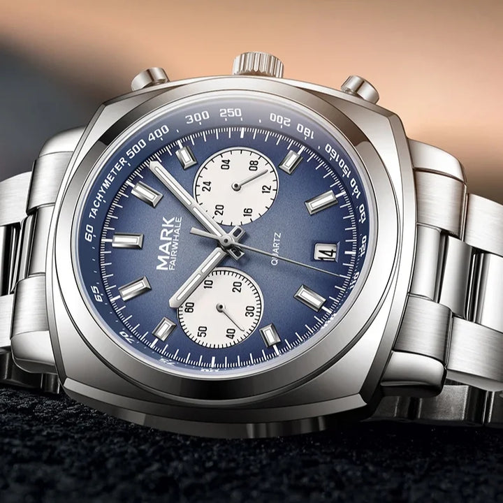 Detailed shot of Mark Fairwhale AURIXON with brushed stainless steel strap and polished bezel.