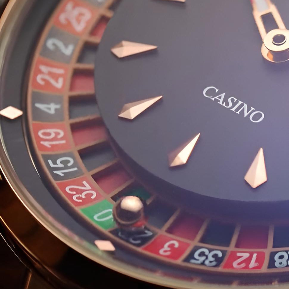 Close-up of the Mark Fairwhale 5031 CASINO watch roulette-style dial with rose gold markers and detailed casino-inspired design.