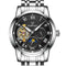 Fairwhale watch with black dial and silver metal strap on a white background