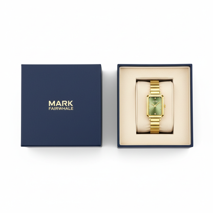 Gold watch in a Mark Fairwhale box on a white background