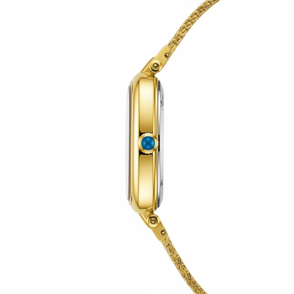 Gold watch with a blue gemstone on a white background