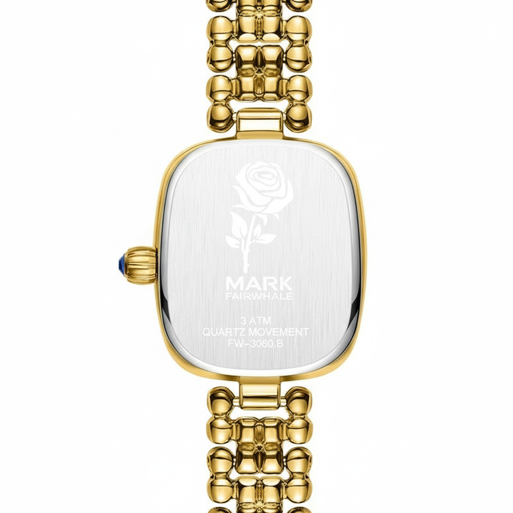 Gold watch with a clear face on a white background