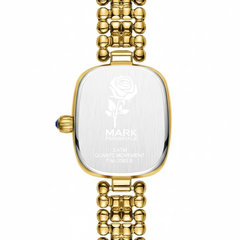 Gold watch with a clear face on a white background