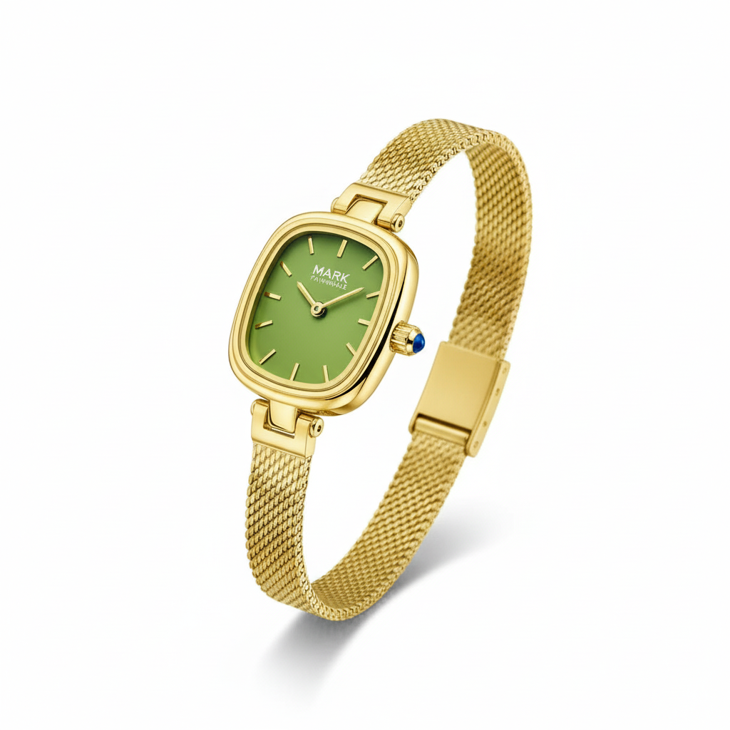 Gold watch with a green face on a white background