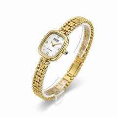 Gold watch with a white face on a white background