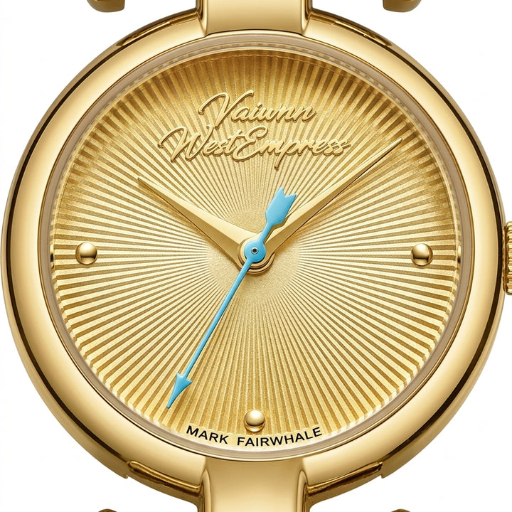 Gold watch with blue hands and &