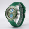 Green watch with detailed face on a light gray background