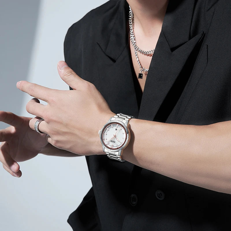 Lifestyle photo of man wearing Mark Fairwhale DRACONIS dragon totem wristwatch with black outfit.