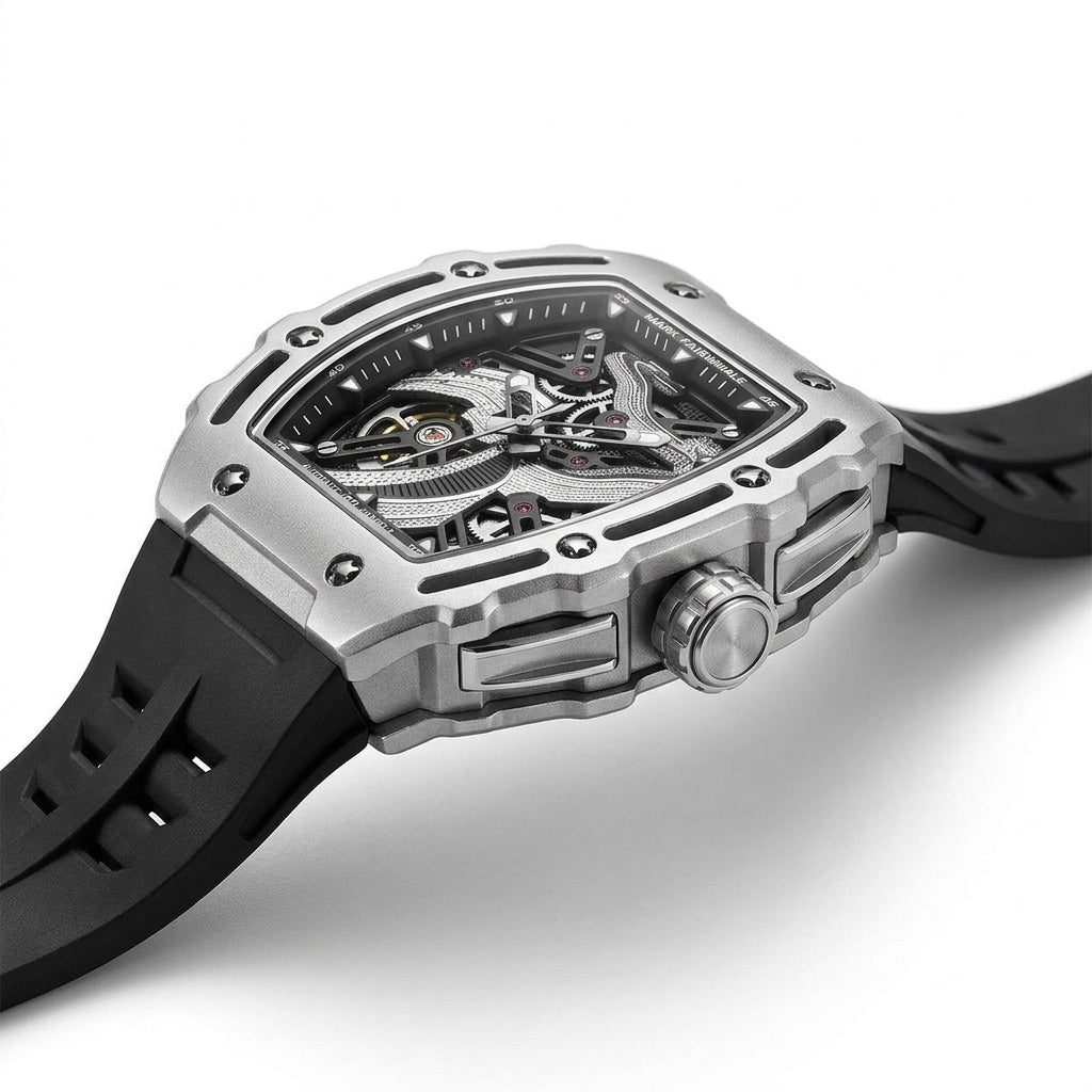 Luxury watch with black strap and silver case on a white background