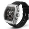Luxury watch with black strap and silver case on a white background