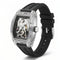 Luxury watch with black strap and transparent case on a white background