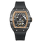 Luxury watch with black strap and intricate design on a white background