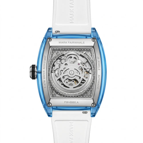 Luxury watch with blue case and white strap on a white background