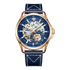 Luxury watch with blue face and navy leather strap on a white background