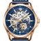 Luxury watch with blue face and rose gold case on white background