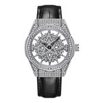 Luxury watch with diamond-studded face and black leather strap on white background