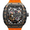 Luxury watch with orange strap and intricate design on a white background