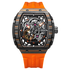 Luxury watch with orange strap and intricate design on a white background
