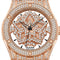 Luxury watch with rose gold case and diamond-studded face on a white background