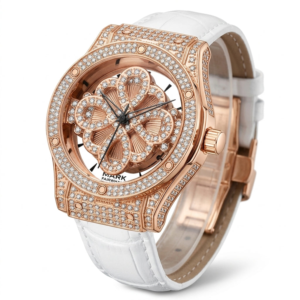 Luxury watch with rose gold case and white strap on a white background