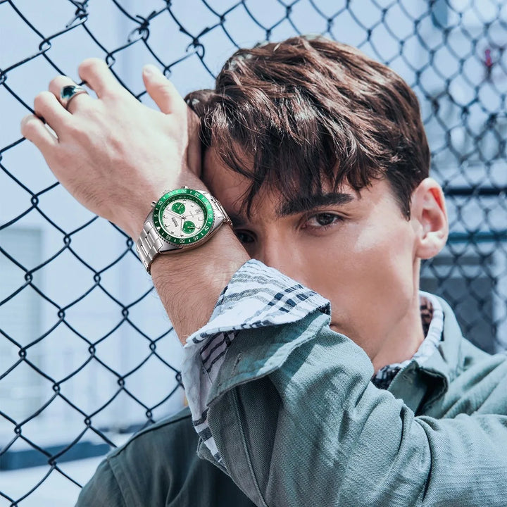 MARK Fairwhale 5910 TARNIX silver and green chronograph watch with tachymeter bezel on wet surface