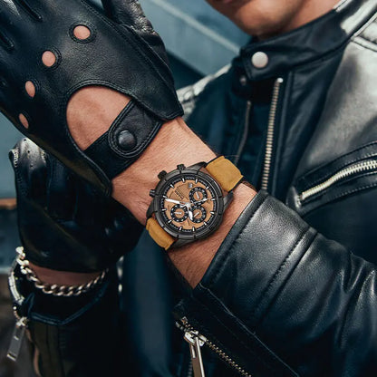 Man wearing Mark Fairwhale NOVANTOR chronograph watch with leather strap and leather jacket