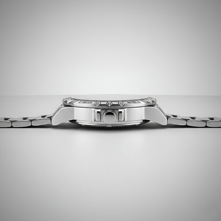 Mark Fairwhale FW 6027 skeleton automatic watch - Close-up of a silver watch on a light gray background