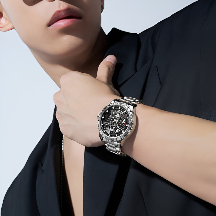 Skeleton automatic watch Mark Fairwhale FW 6027 worn on wrist showing modern steel bracelet and openworked dial