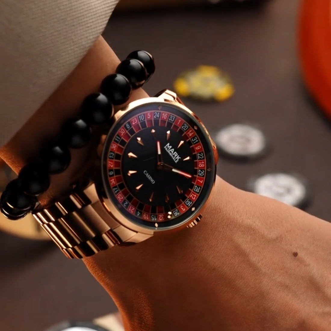 Mark Fairwhale 5031 CASINO rose gold luxury men’s watch with roulette-inspired dial, shown on wrist in a casino lifestyle setting.