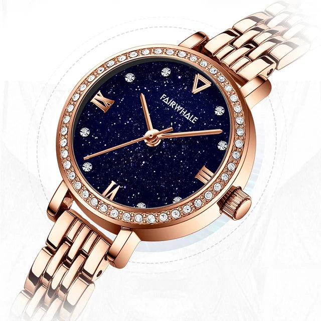 Mark Fairwhale 3250 LUNAERA quartz watch showing rose gold crown, starry blue dial, and crystal-embellished bezel for luxury detailing