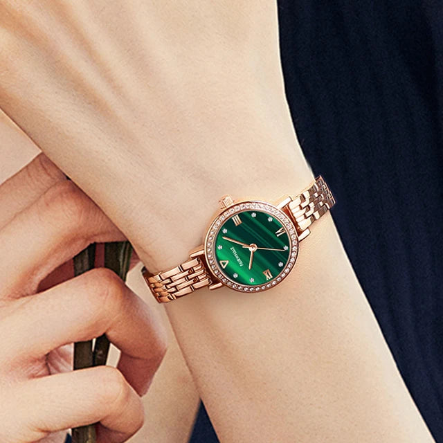 Mark Fairwhale 3250 LUNAERA quartz watch showing rose gold crown, starry green dial, and crystal-embellished bezel for luxury detailing