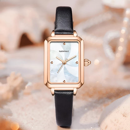 Mark Fairwhale 3290 NOVEA women’s vintage square watch with rose gold case and black leather strap, styled among pearls and golden glitter