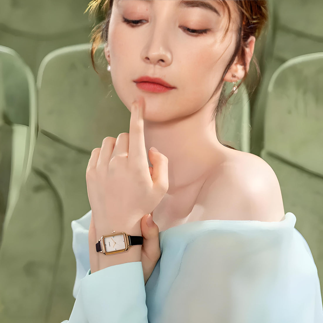 Mark Fairwhale 3290 NOVEA women’s vintage square watch with rose gold case and black leather strap, styled among pearls and golden glitter