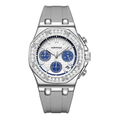 Mark Fairwhale 3590 VIVENA women’s retro watch with gray silicone strap and blue chronograph dial on sand, showcasing elegant design and sparkling bezel