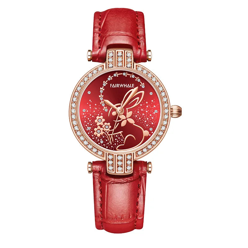 Mark Fairwhale 3600 BLOOMI women’s watch in rose gold with crystal-set bezel and red rabbit motif dial, showcasing fine craftsmanship