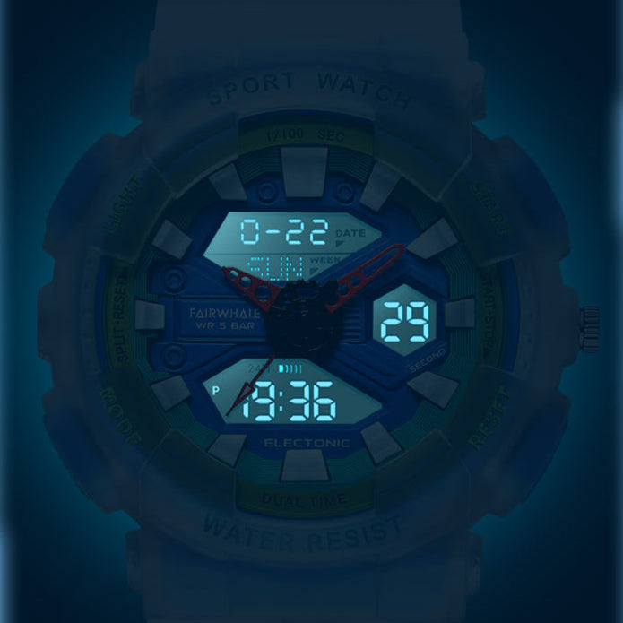 Mark Fairwhale 4370 VYBRO analog-digital watch with bright blue LED illumination showing dual time, calendar, and chronograph display in the dark.