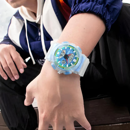 Mark Fairwhale 4370 VYBRO analog-digital watch with bright blue LED illumination showing dual time, calendar, and chronograph display in the dark.