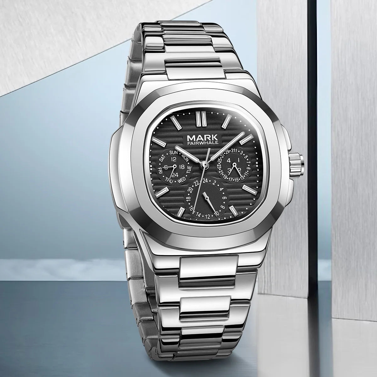 Mark Fairwhale 5019 LUMENIX stainless steel watch with black dial on a reflective background.