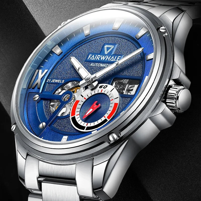 Mark Fairwhale 6070 TREZOR skeleton automatic watch with blue dial and stainless steel bracelet, showcasing open-heart mechanics