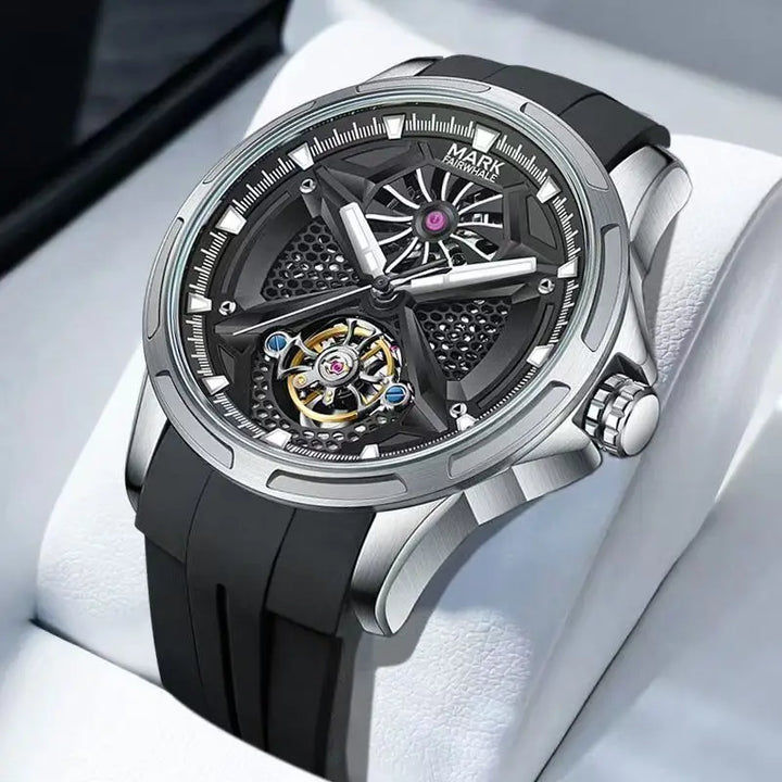 Close-up of Mark Fairwhale  FW-6008 AEROTOR skeleton automatic watch with black silicone strap and tourbillon-style rotating movement.