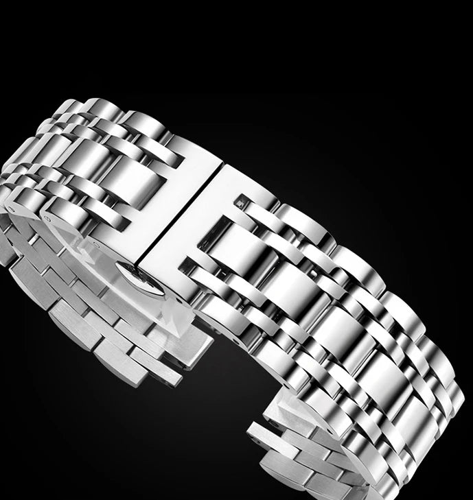 Mark Fairwhale AURION FW-5360 moon phase chronograph watch close-up with water droplets highlighting stainless steel case