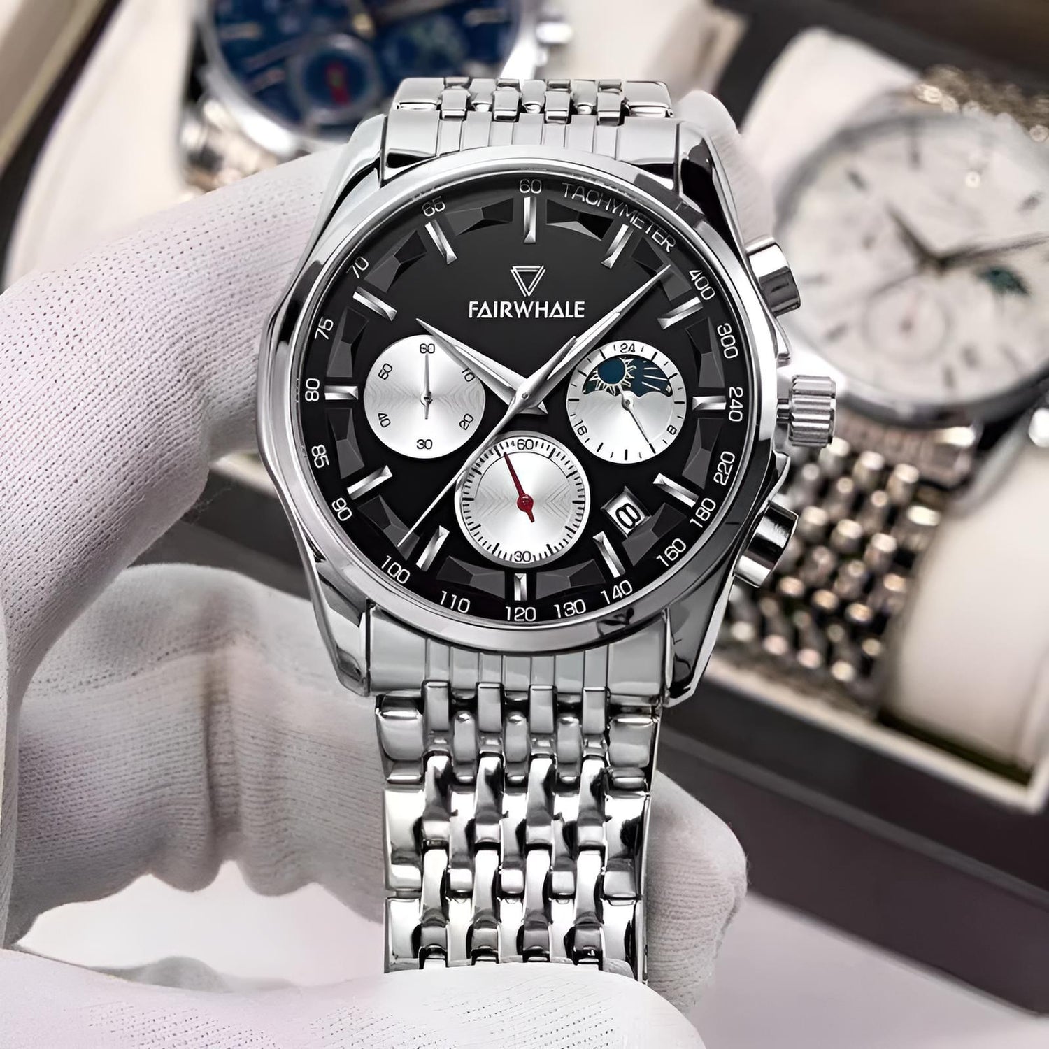 Mark Fairwhale AURION FW-5360 moon phase chronograph watch close-up with water droplets highlighting stainless steel case