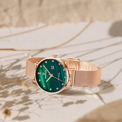 Mark Fairwhale ELARIA FW-3240 minimalist green dial quartz watch displayed on a marble background.