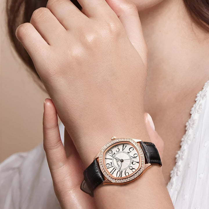 Mark Fairwhale FW-3440 ORIKA women’s irregular-dial watch in black leather strap with rose-gold bezel and bold black numerals, a statement of artistic elegance