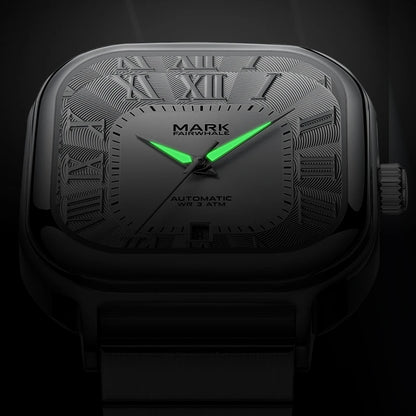 Mark Fairwhale IONIRUS men’s square watch with luminous glowing hands in low light.