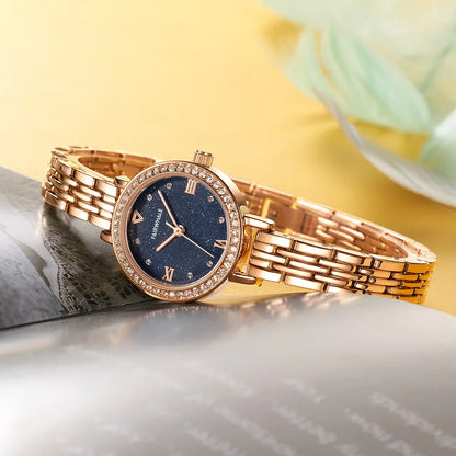 Mark Fairwhale LUMORA 3250 luxury women’s quartz watch with starry dial displayed on book – elegant flat lay