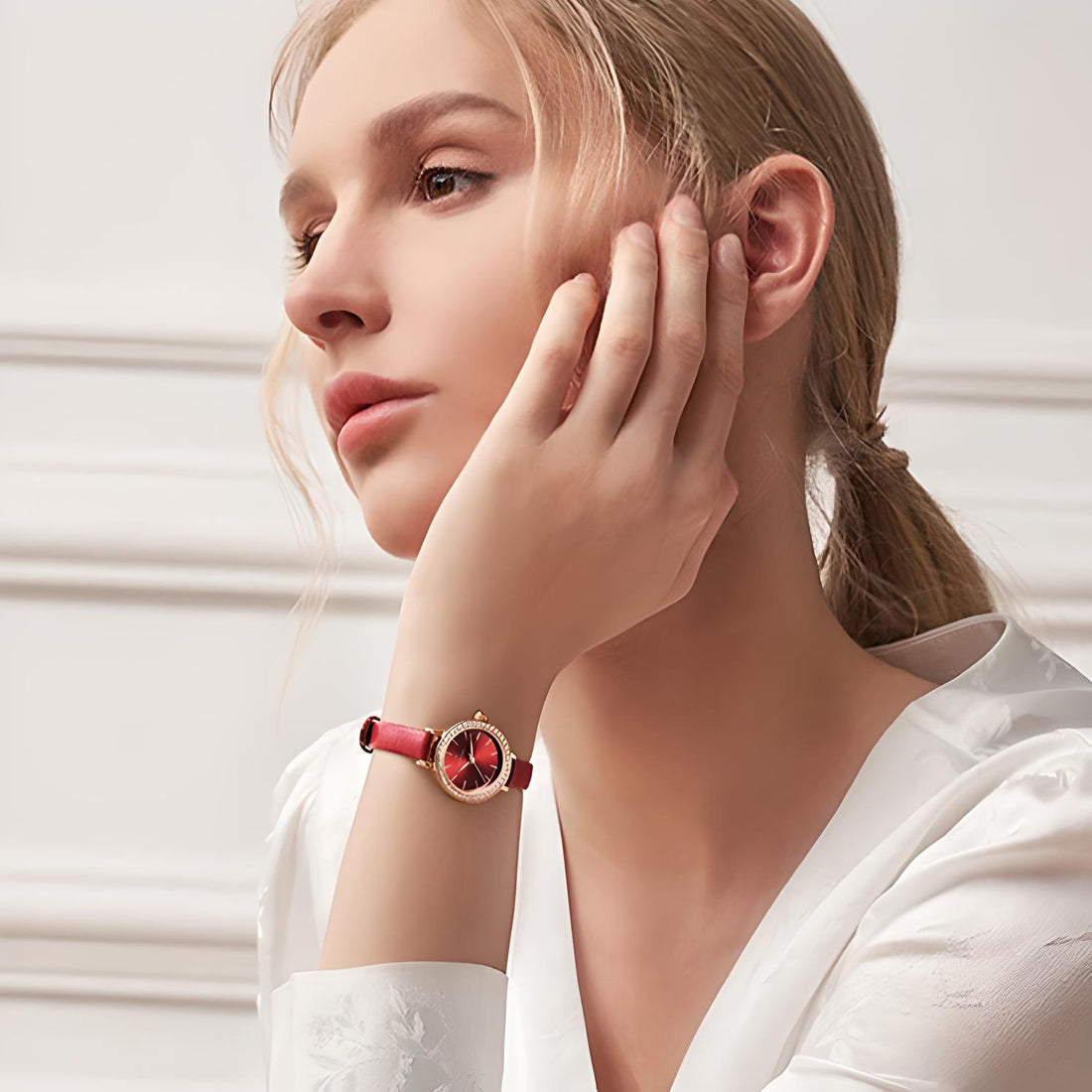 Mark Fairwhale ROVIA 3280 women’s fashion watch with red leather strap and crystal bezel on satin background