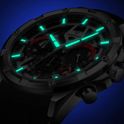 Mark Fairwhale TONIX sports chronograph glowing luminous hands in low light.