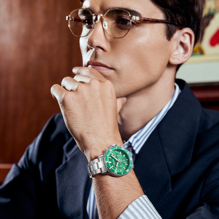 Mark Fairwhale luminous green chronograph watch glowing in the dark, men’s waterproof stainless steel timepiece with luminous hands.