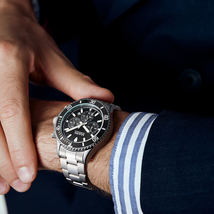 Mark Fairwhale men’s luxury chronograph watch with emerald green dial and stainless steel bracelet, bold design for modern style.